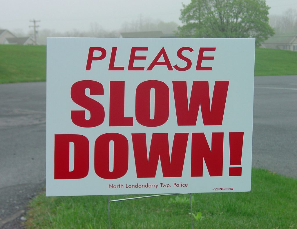 slow down sign